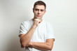© Studio KIVI - Portrait of a handsome guy in a white T-shirt