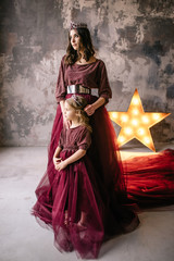 Wall Mural - mother and daughter in the image of the queen and the princess i