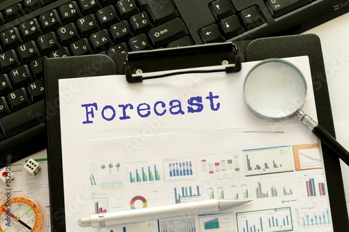 Cuadros en Lienzo forecast - message on financial data chart with magnifier and keyboard