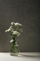 Wall Mural - White flowers in glass vase