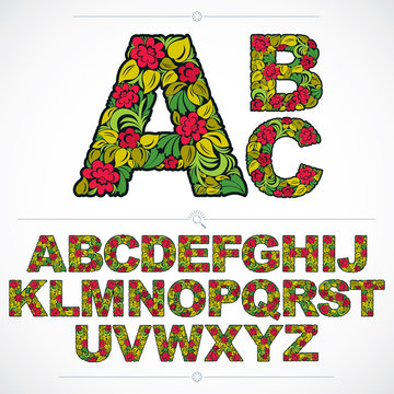 Set of vector ornate capitals, flower-patterned typescript. Colo
