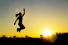 Happy Woman Jumping Silhouette - Positive Emotions Concept