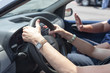 © Mihajlo Maricic - Senior learning to drive a car with a driving instructor