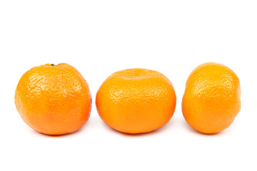 Fruits of a tangerine on a white background.