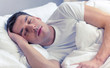 © Syda Productions - handsome man sleeping in bed