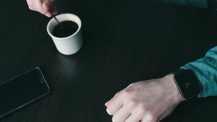 Young man using a smart watch