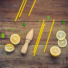 Fresh lemon and wooden juicer for summer juice and cocktail. Fre