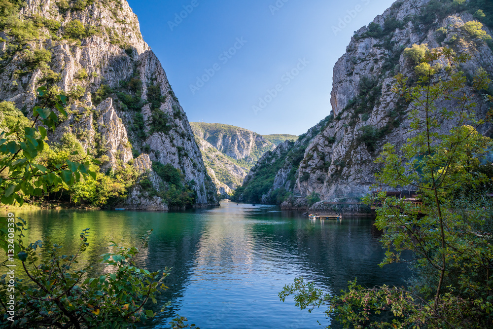 View of beautiful tourist attraction, lake at Matka Canyon in the Skopje surroundings. Macedonia. - obrazy, fototapety, plakaty 
