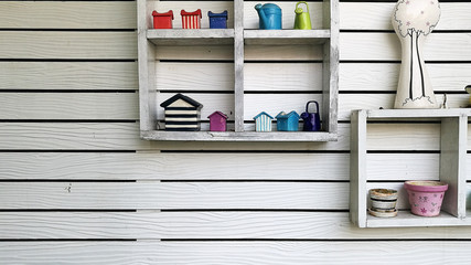 decorative wall with shelf make from white wood texture background