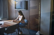 © Andy Paul - Caucasian businesswoman in an office meeting room