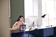 © Andy Paul - Caucasian Businesswoman in an office