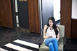 © Andy Paul - Caucasian businesswoman in an office break out area