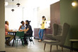 © Andy Paul - Business colleagues discussing in modern office