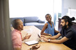 © Andy Paul - Multi ethnic business colleagues in an office meeting
