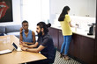 © Andy Paul - Multiethnic business colleagues in an office meeting