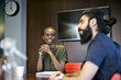 © Andy Paul - Multi ethnic business colleagues in an office meeting