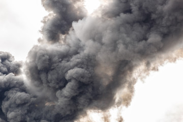 a thick smoke covering part of the sky