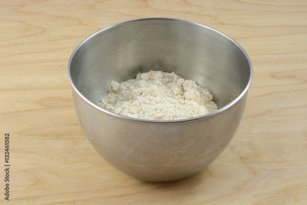 Packaged dry cookie or cake mix in stainless steel mixing bowl Stock Photo Adobe Stock