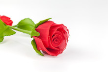Artificial Red Rose On White Background