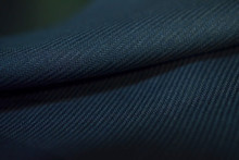 Close Up Roll Dark Blue Fabric With Stripe Line Of Suit