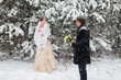 © familylifestyle - Winter wedding couple