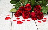 Fototapeta  - Red roses with silk hearts