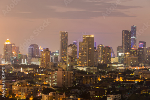 Fototapeta na szkło Cityscape downtown background night view, Bangkok Thailand