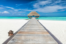 Wooden Jetty Leading To Relaxation Lodge. Maldives Islands