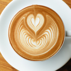 coffee latte art and  mocha on old wooden background square fram