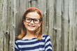 © annanahabed - Outdoor portrait of a cute little 9 year old girl wearing eyeglasses