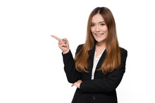 Young Beautiful Asian Businesswoman Pointing Something On White Background. Image With Clipping Path.