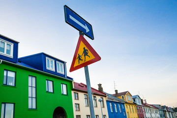 A colourful street in Reykjavik with school and one way signs