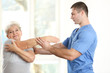 © Africa Studio - Physiotherapist working with elderly patient in clinic