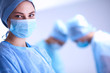 © lenets_tan - Team surgeon at work in operating room.
