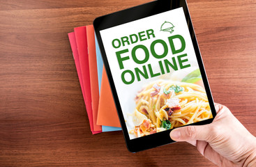 Poster - Close up Two hand holding tablet with order food online word, Di