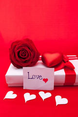 Valentines gift box with a red bow on red background Image of Va