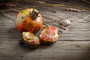 Pomegranate on wooden background