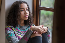 Sad Depressed Mixed Race African American Teenager Woman