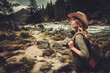 © Nejron Photo - Beautiful woman hiker enjoying amazing landscapes near wild mountain river