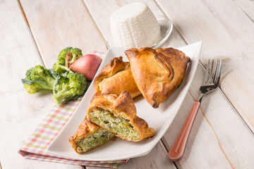 Sticker - oven panzerotti with broccoli and ricotta cheese