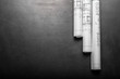 © fotofabrika - Construction planning drawings on black background
