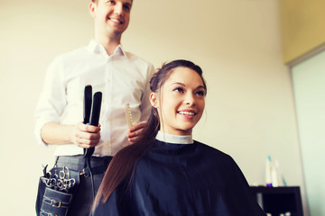 Sticker - happy woman with stylist making hairdo at salon