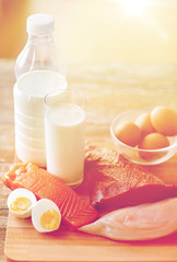 Wall Mural - close up of natural protein food on wooden table