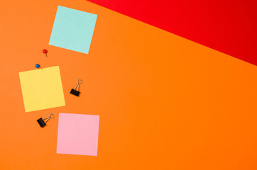 Leinwandbilder - Sticky notes reminder on colorful office table or desk seen from above. Top view product photograph. Concept image with blank copy space