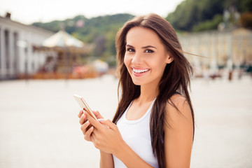 Sticker - Portrait of beautiful smiling woman  writing message in city