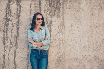 Sticker - Happy smiling young woman in glasses with crossed hands