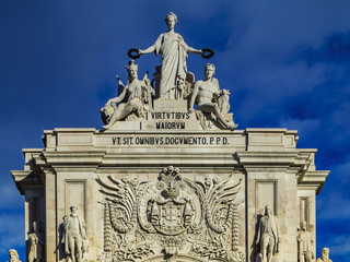 Wall Mural - Portugal, Lisbon, Commerce Square, View of the Rua Augusta Arch with statues Glory rewarding Valor and Genius by Celestin Anatole Calmels.