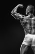 © _italo_ - Strong Athletic Man Fitness Model posing back muscles, triceps,