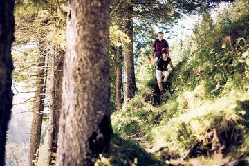 Wall Mural - Hiking Seniors in Forest