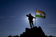 Soldier on top of the mountain with the Indian flag